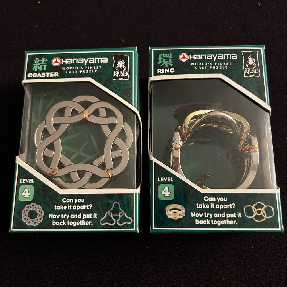 (2) Two Hanayama World’s Finest Cast Puzzles
“Coaster” and “Ring”